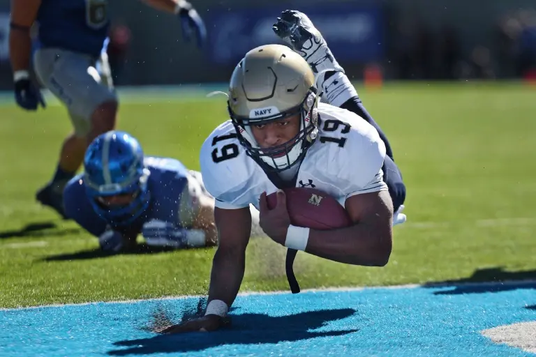 Football player makes a touchdown